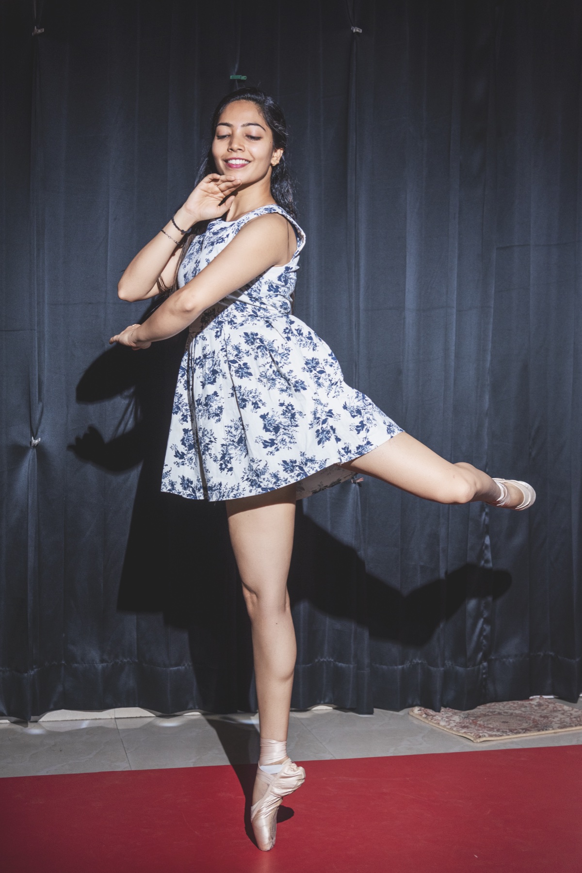 Tapti holding a graceful ballet pose